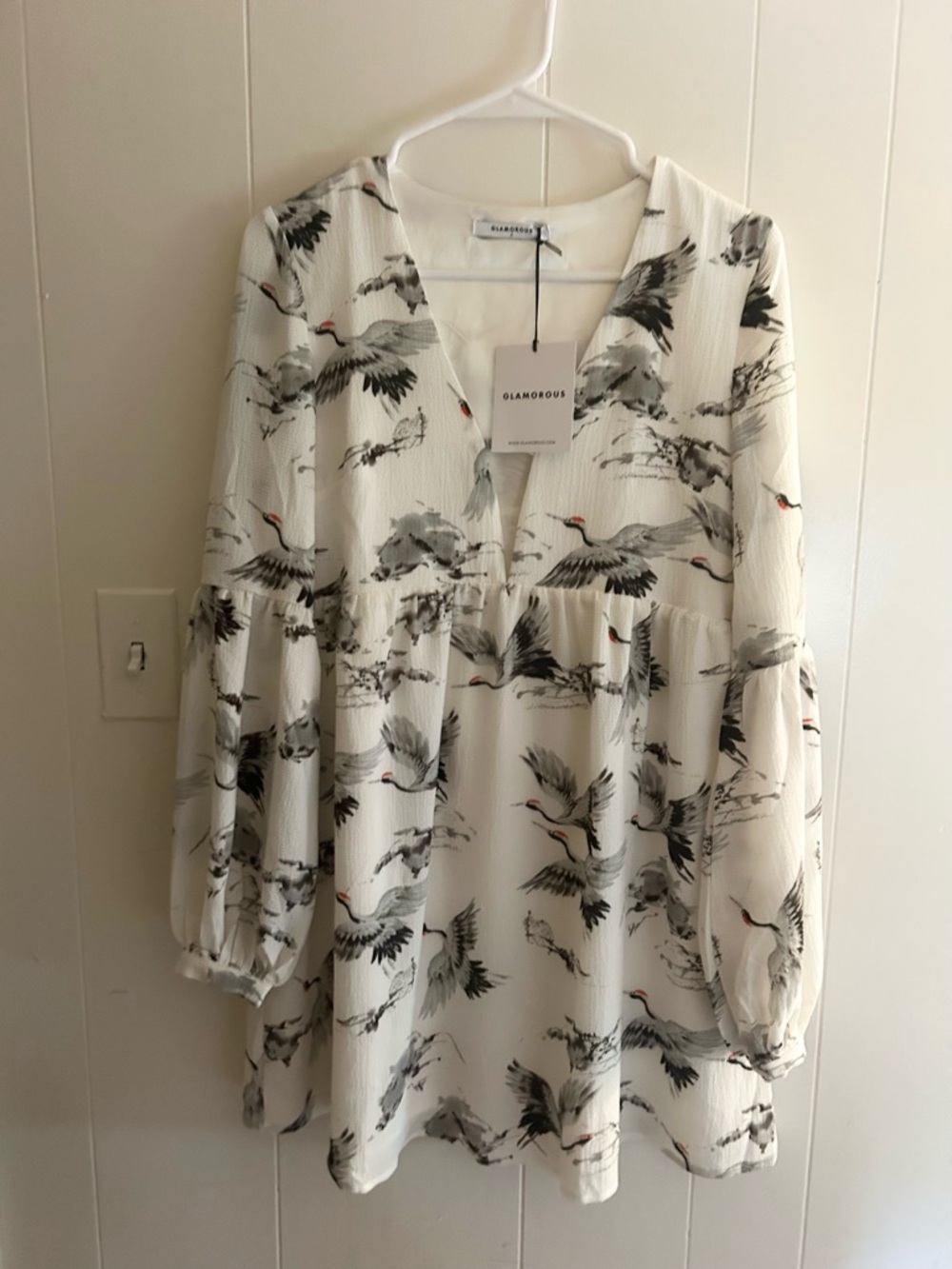 Glamorous White Dress with Bird Motif